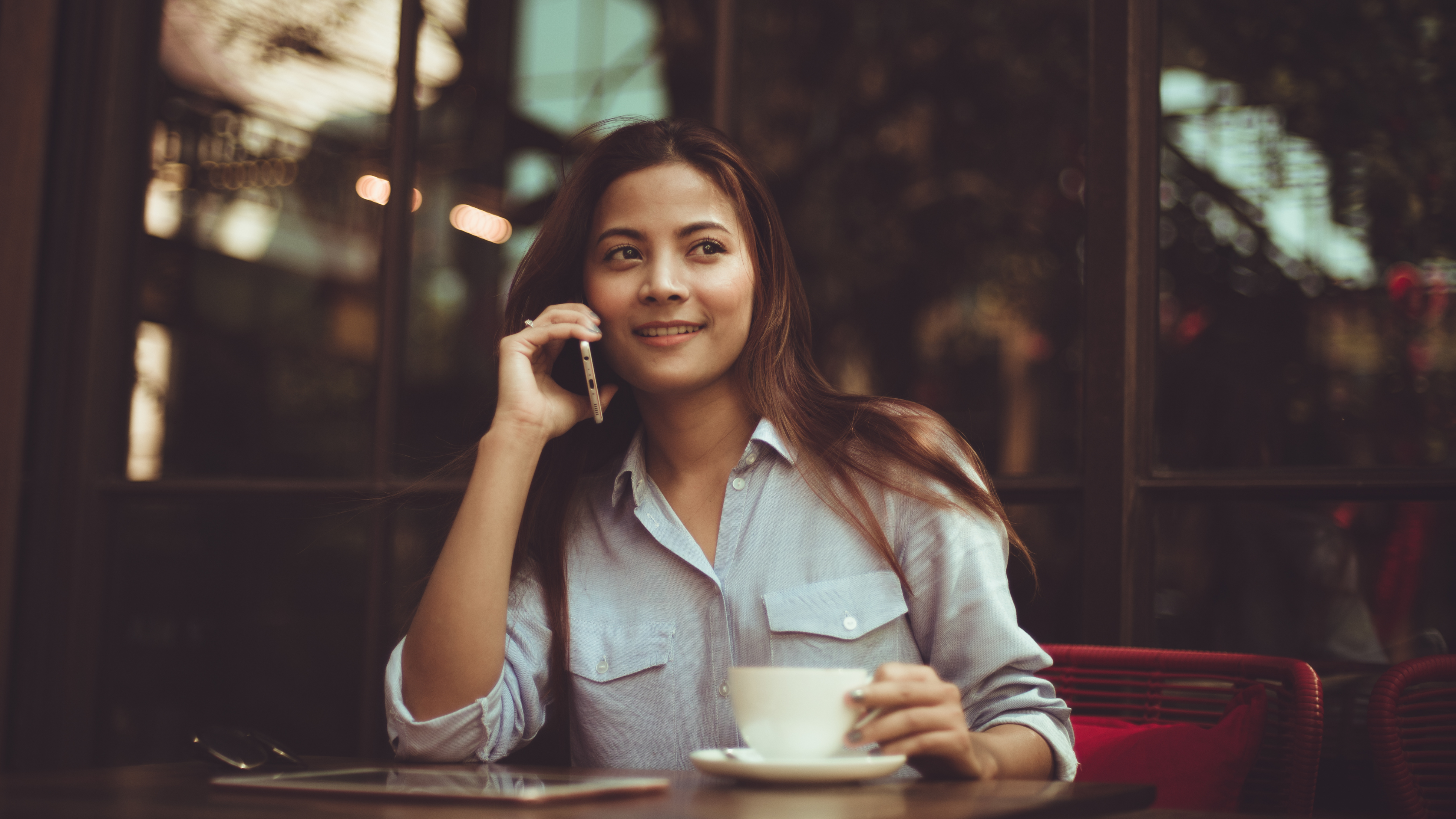 Woman on phone, contact us page